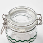 KORKEN Jar with lid, clear glass/patterned green, 13 cl