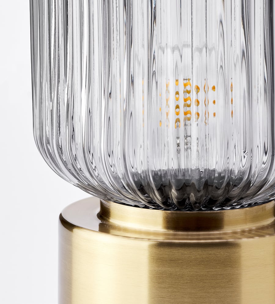 SOLKLINT
Table lamp, brass/grey clear glass