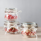 KORKEN Jar with lid, patterned/bright red, 13 cl