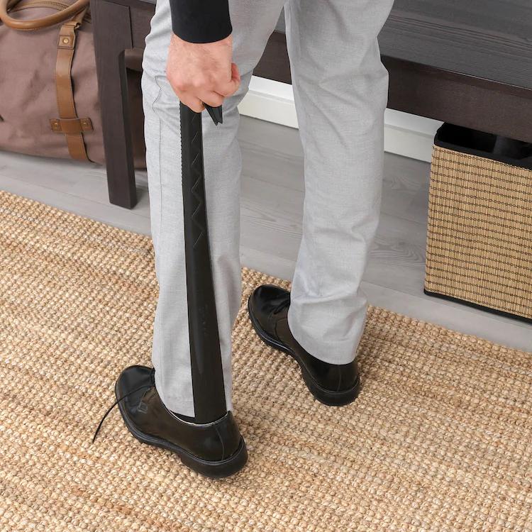 OMSORG

Shoehorn, black