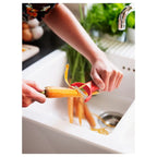 STÄM

Peeler, red, white/black.