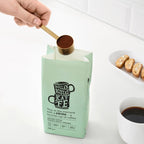 TEMPERERAD

Coffee measure and clip, brass