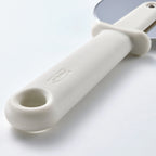 UPPFYLLD Pizza cutter, off-white